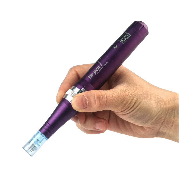 A hand holding  Dr. Pen Ultima X5 Derma Pen  