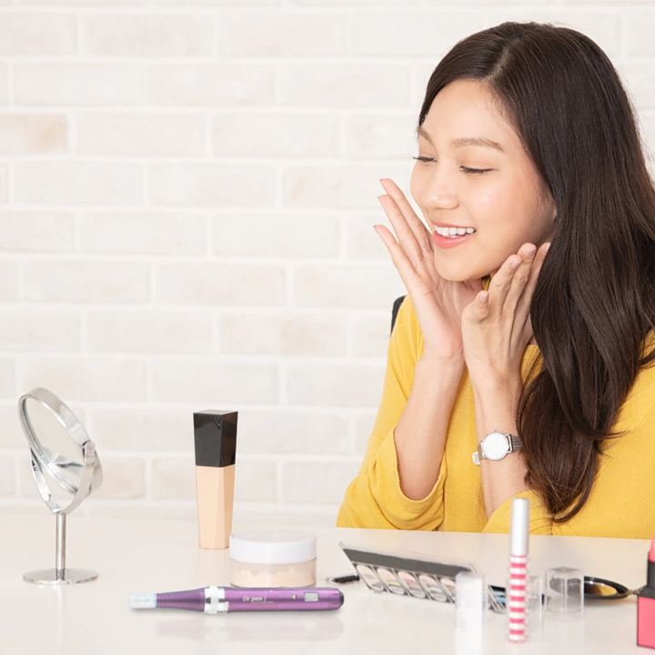 Women having Dr. Pen Ultima X5 Microneedling Pen on her make up table