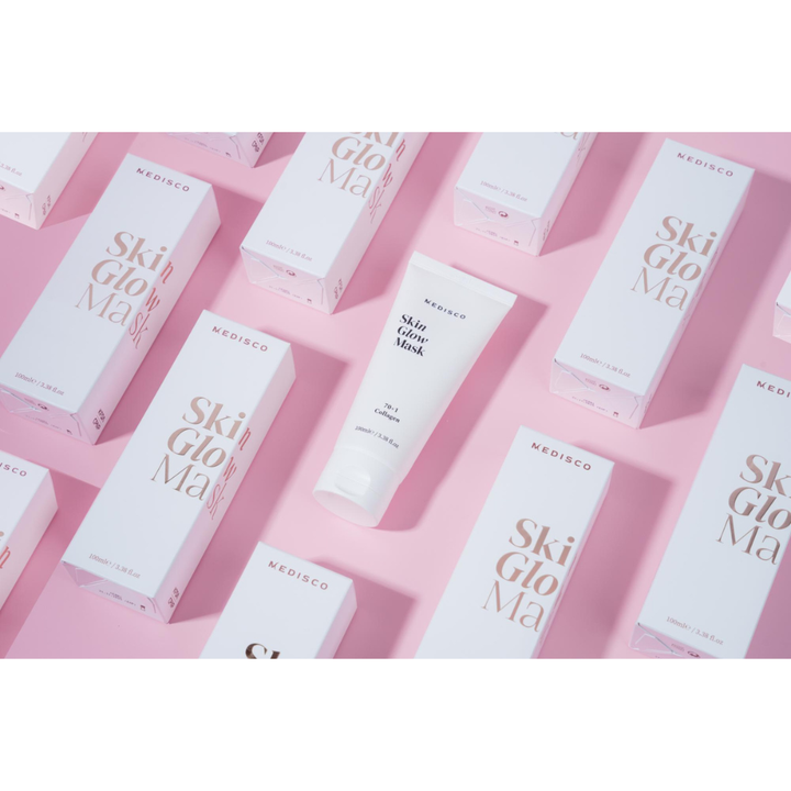 Medisco SkinGlow PDRN Collagen Mask displayed with product boxes on a pink background.